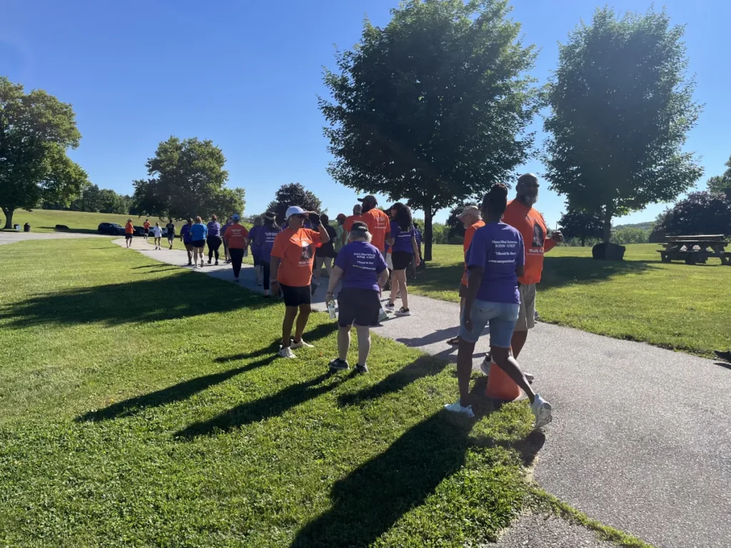 Folks walking along the path at Walk for Me 2024